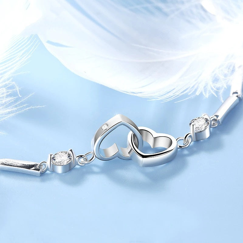 Close-up of the interlocked hearts and cubic zirconia stones