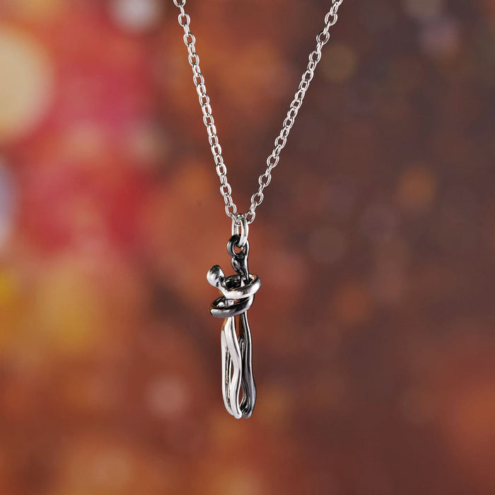 Affectionate Couple Hugging Pendant Necklace — embracing couple pendant